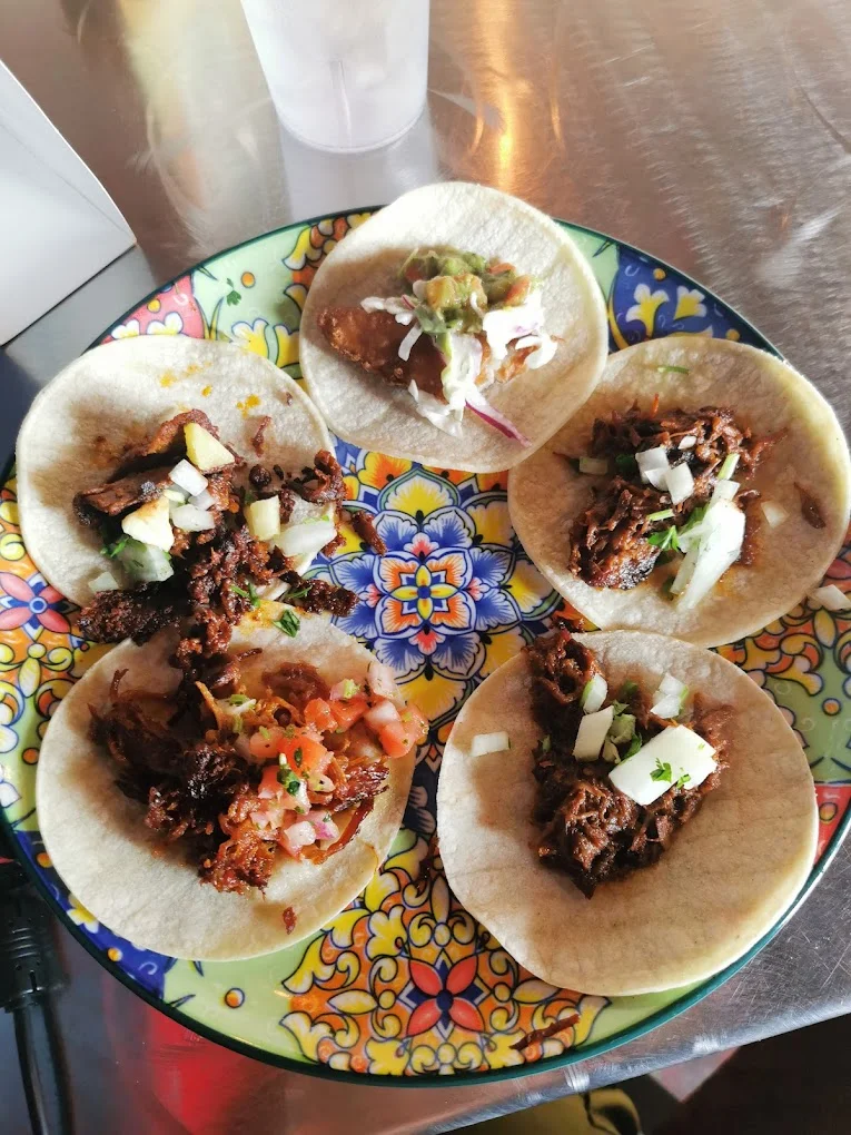 PiKanté takeout service — birria tacos and carnitas ready for pickup at Bountiful Farmers Market Edmonton